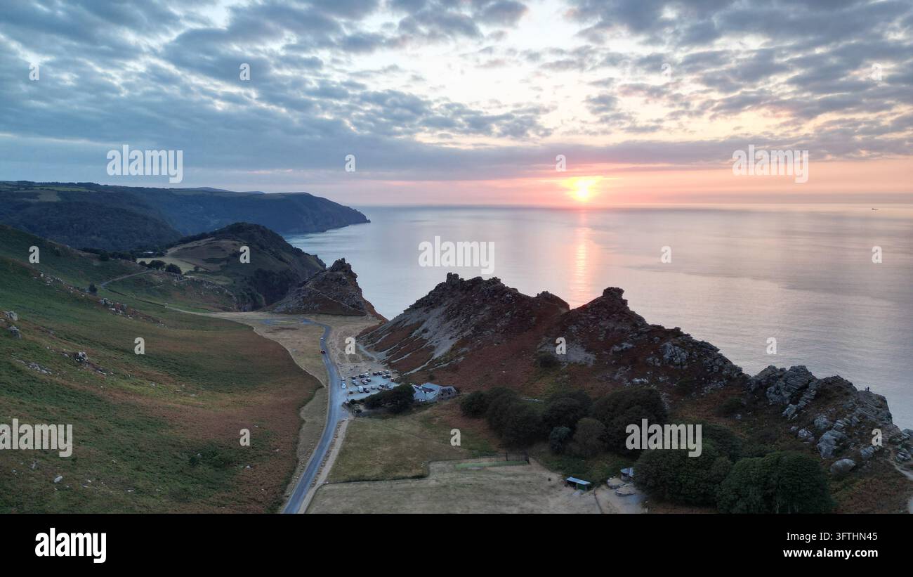 Aerial view of Sunset at Valley of Rocks featuring dramatic coastal ...