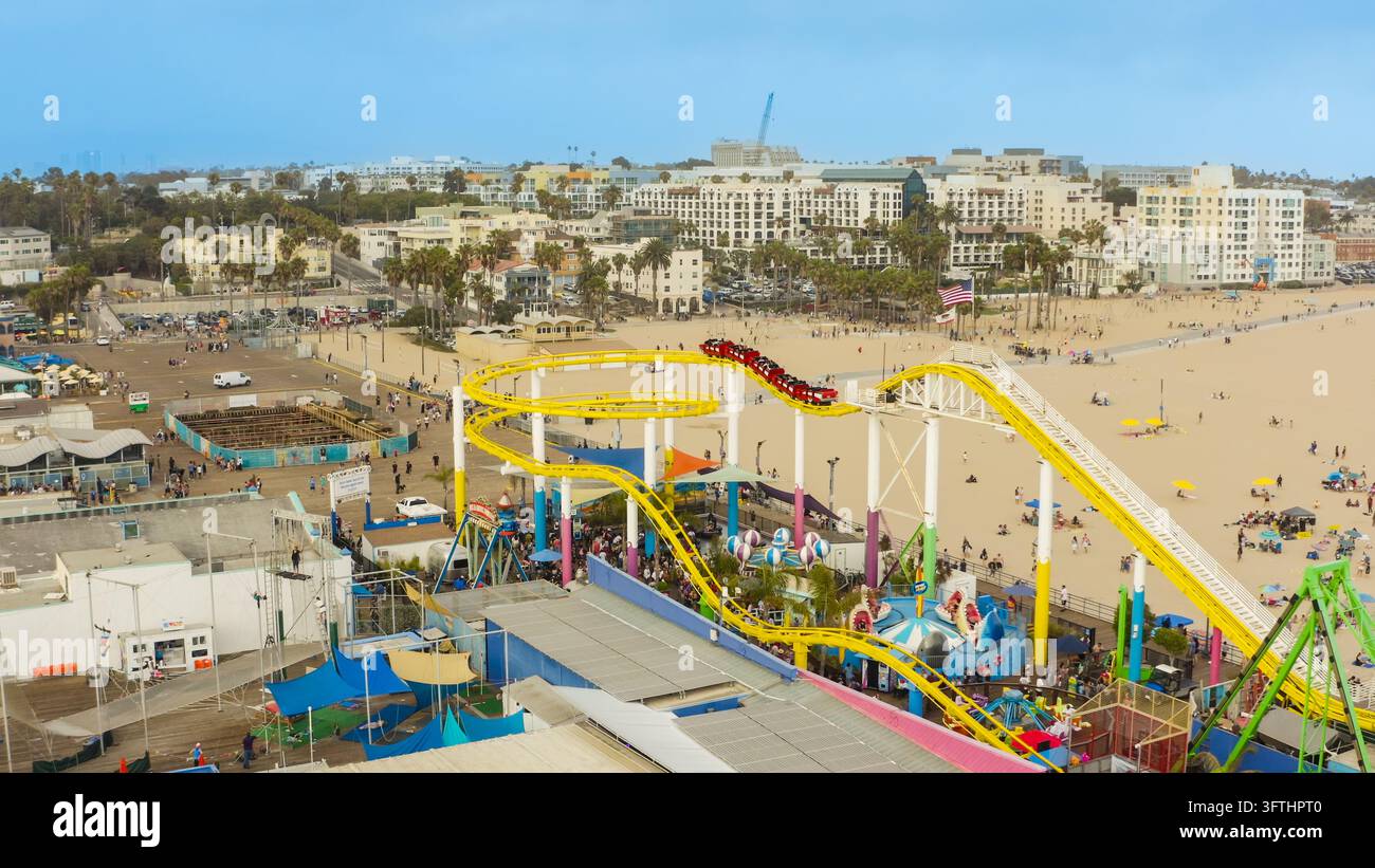Aerial view of the Santa Monica Pier with its iconic yellow roller ...
