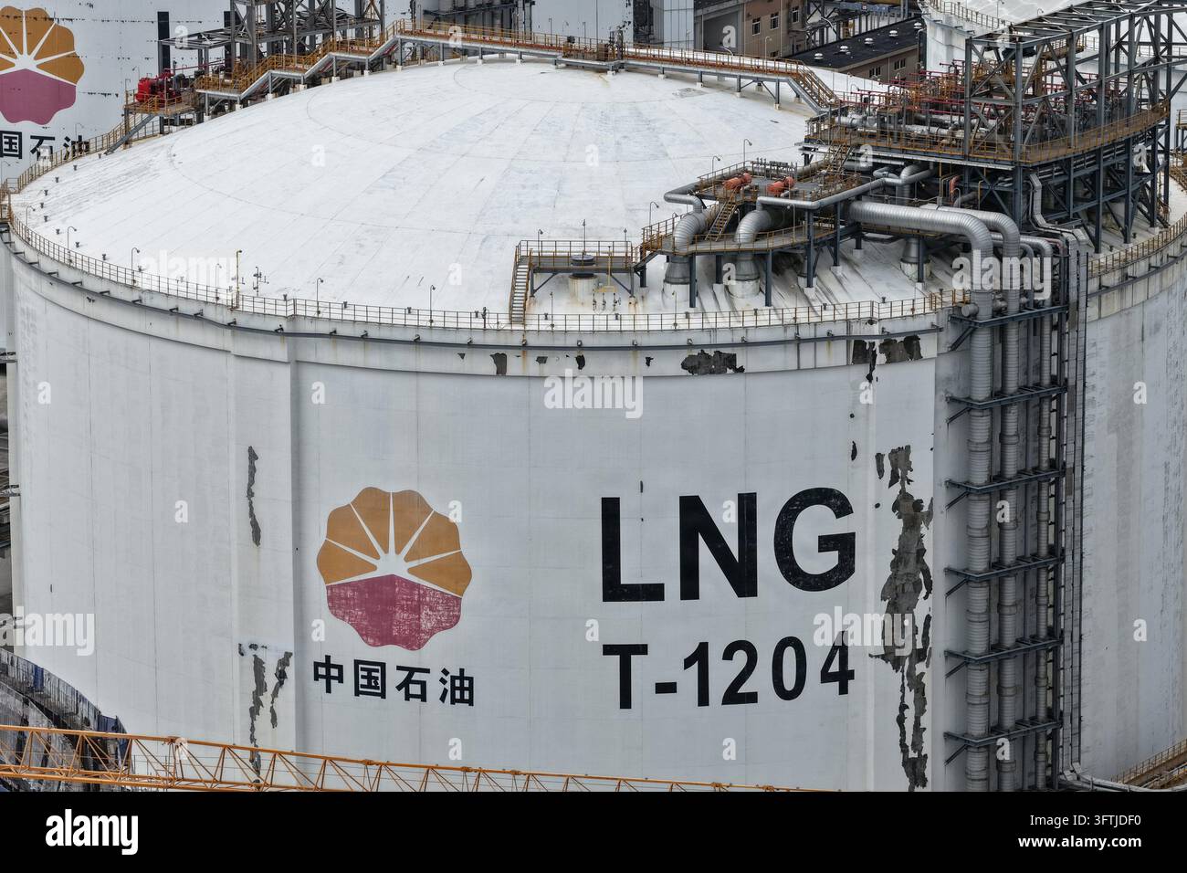 Model Tank Shelf NANTONG, CHINA - OCTOBER 15, 2026 - China Petroleum LNG storage tank at ...