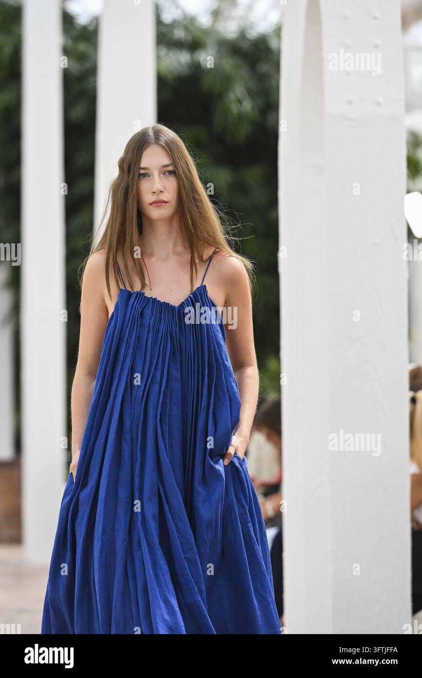Sevigna Model A model parades with Simorra design during Mercedes Benz Fashion Week ...