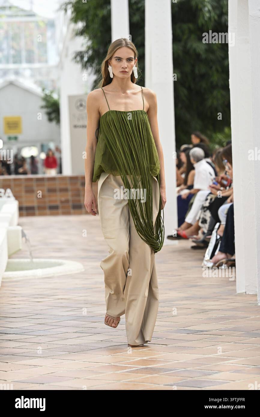 Sevigna Model A model parades with Simorra design during Mercedes Benz Fashion Week ...