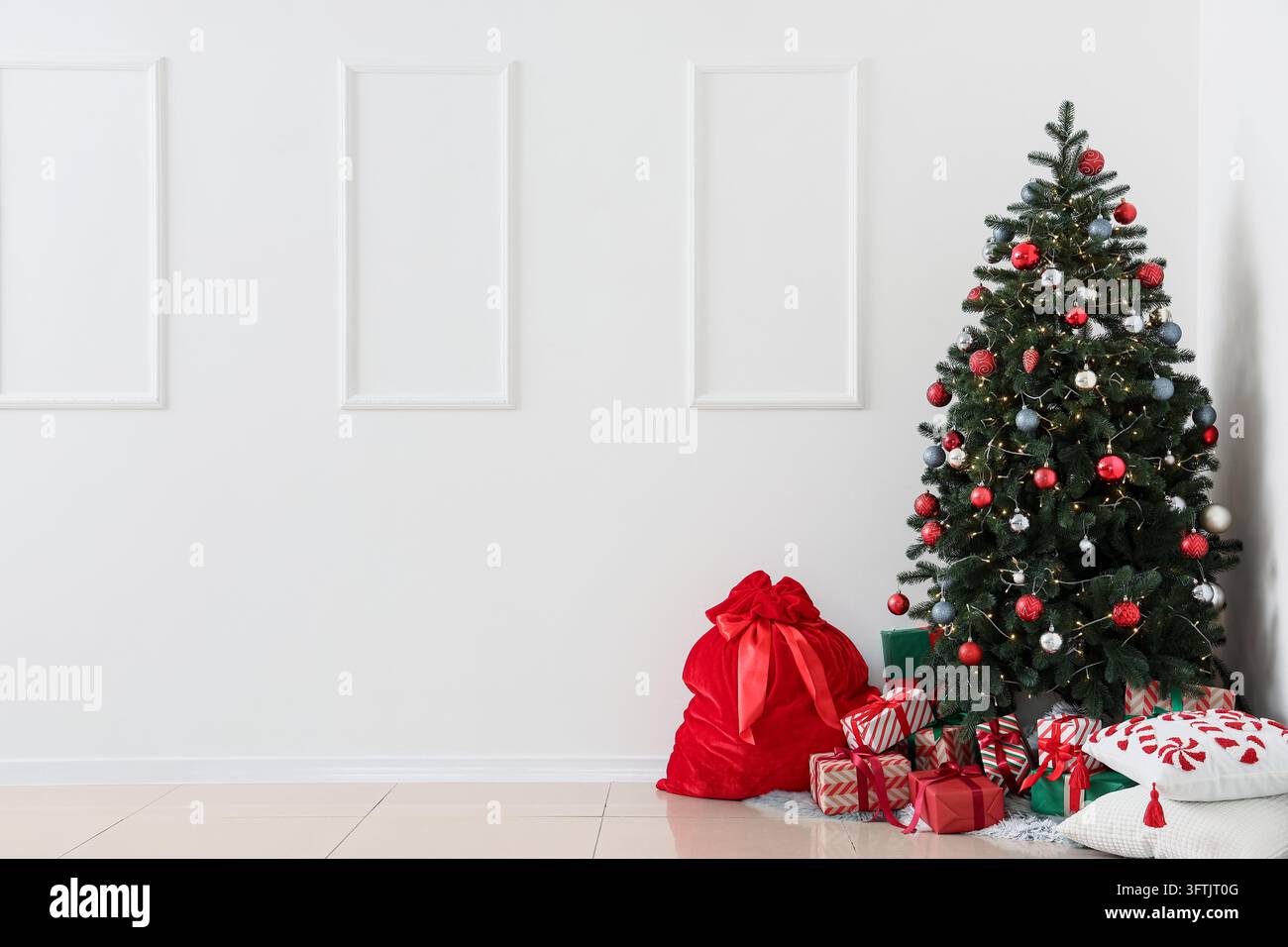 Christmas celebration and holiday season, decorated pine tree with gift ...