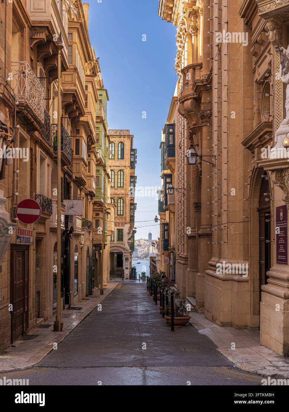 Traditional Frames Valletta, Malta - April 8, 2024: A narrow historic street in Valletta ...