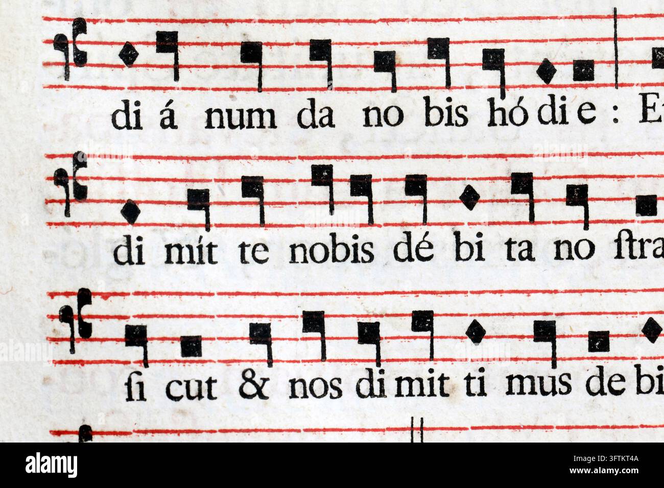 Rfs Score A close-up of a page from an old liturgical missal showing a Gregorian ...