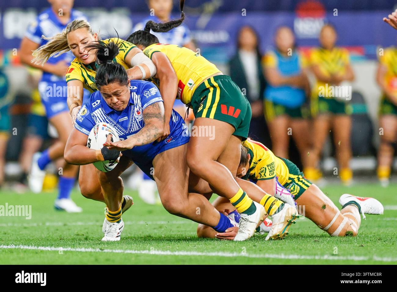 Annetta Nuuausala of Samoa is tackled during the Women's Rugby League ...