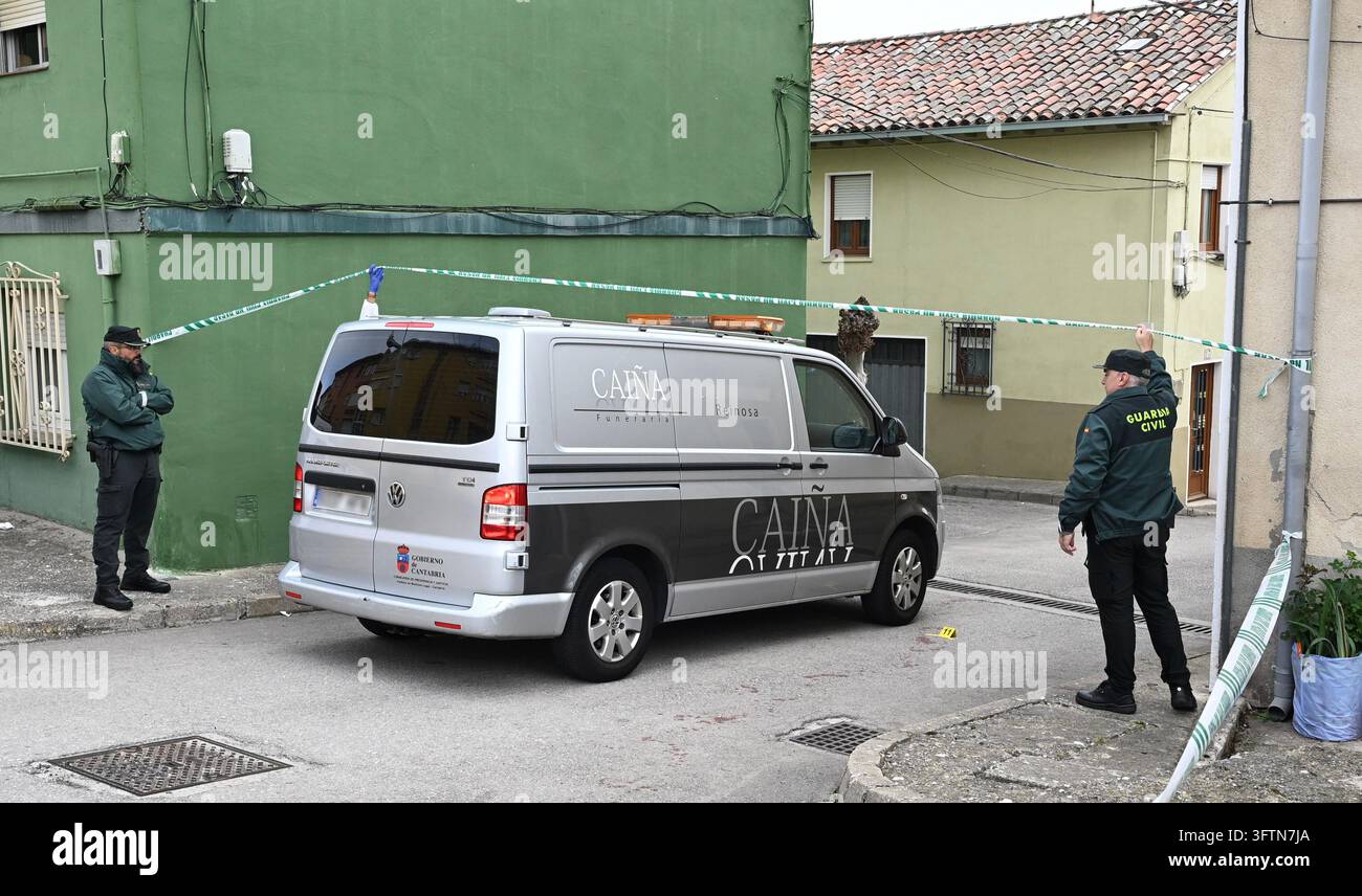 A funeral home van at the scene of the crime, on 16 October 2026, in ...