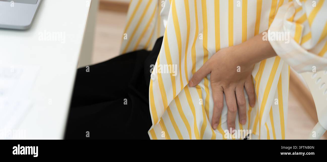 woman holding back while and suffer from unbearable pain health and ...