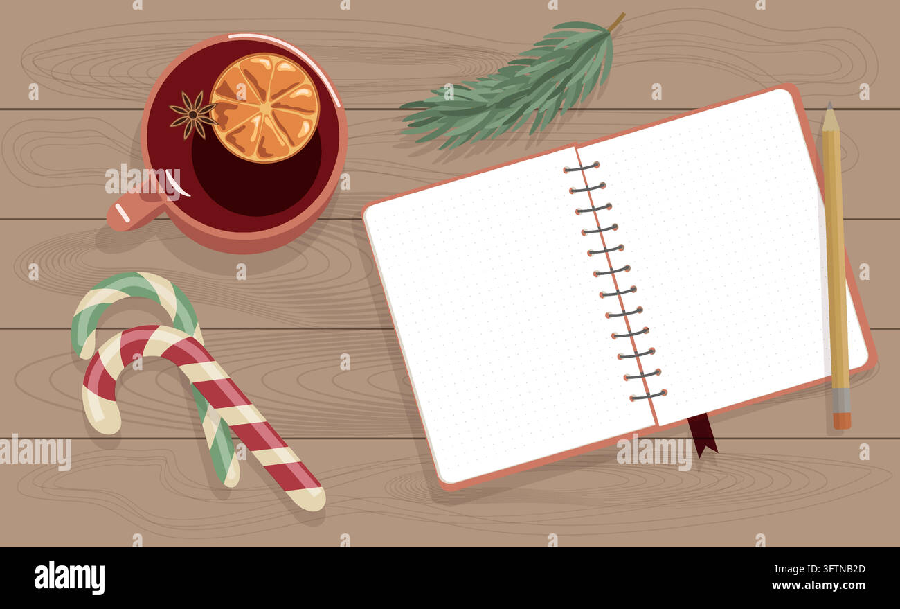 Flat lay Christmas notepad with pencil and mulled wine mug on wooden ...