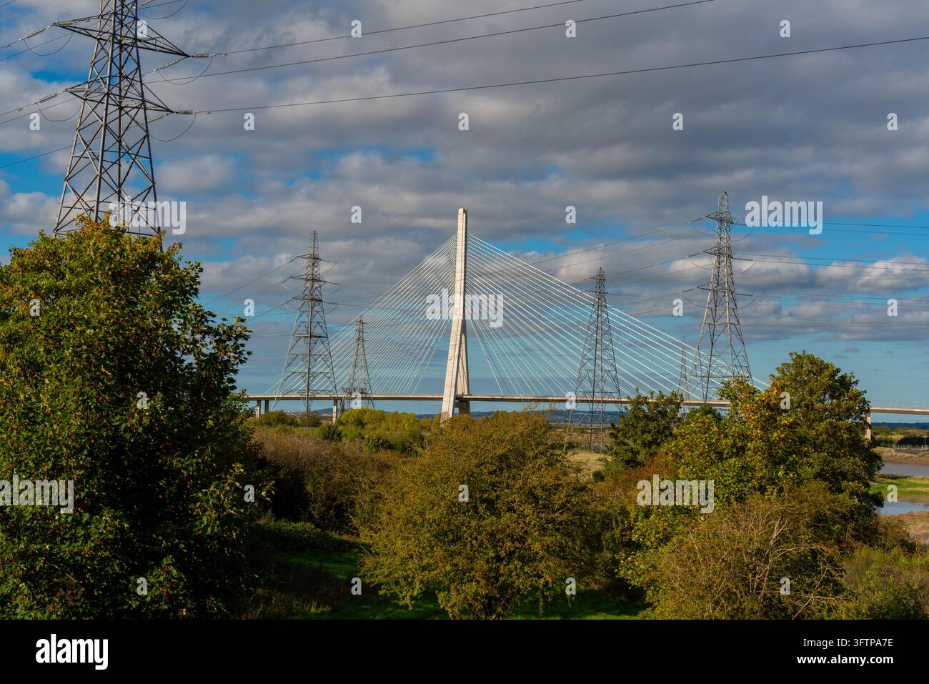 View of the Flintshire Bridge, a cable-stayed bridge, with electricity ...