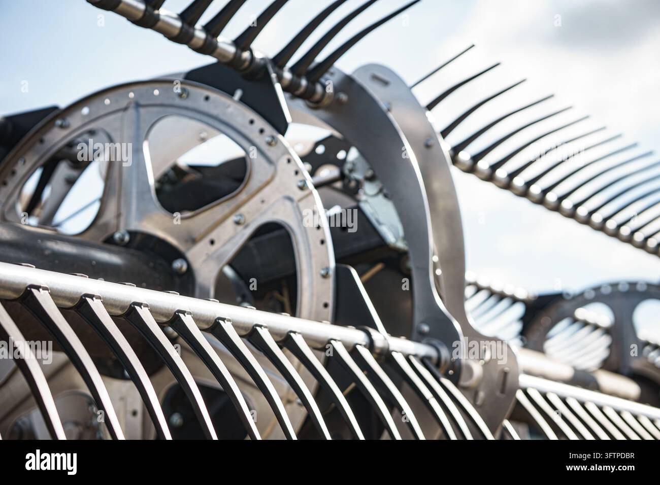 View of the intricate metal components of a futuristic combine ...