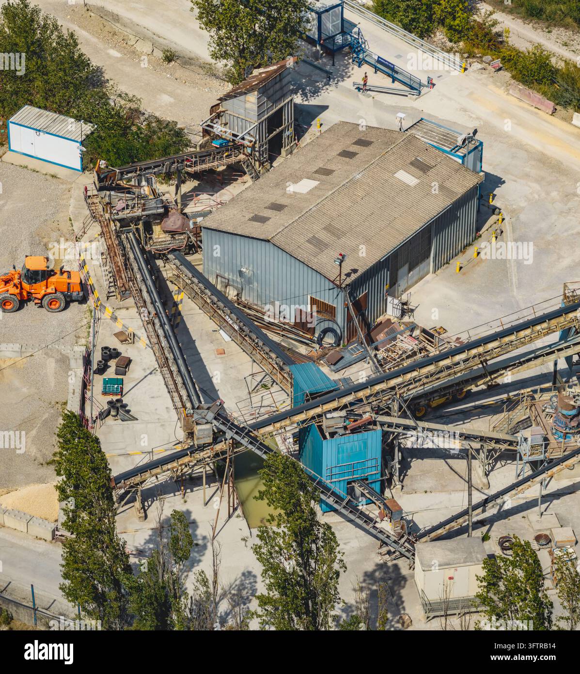 Aerial view of an industrial gravel processing plant with a production ...