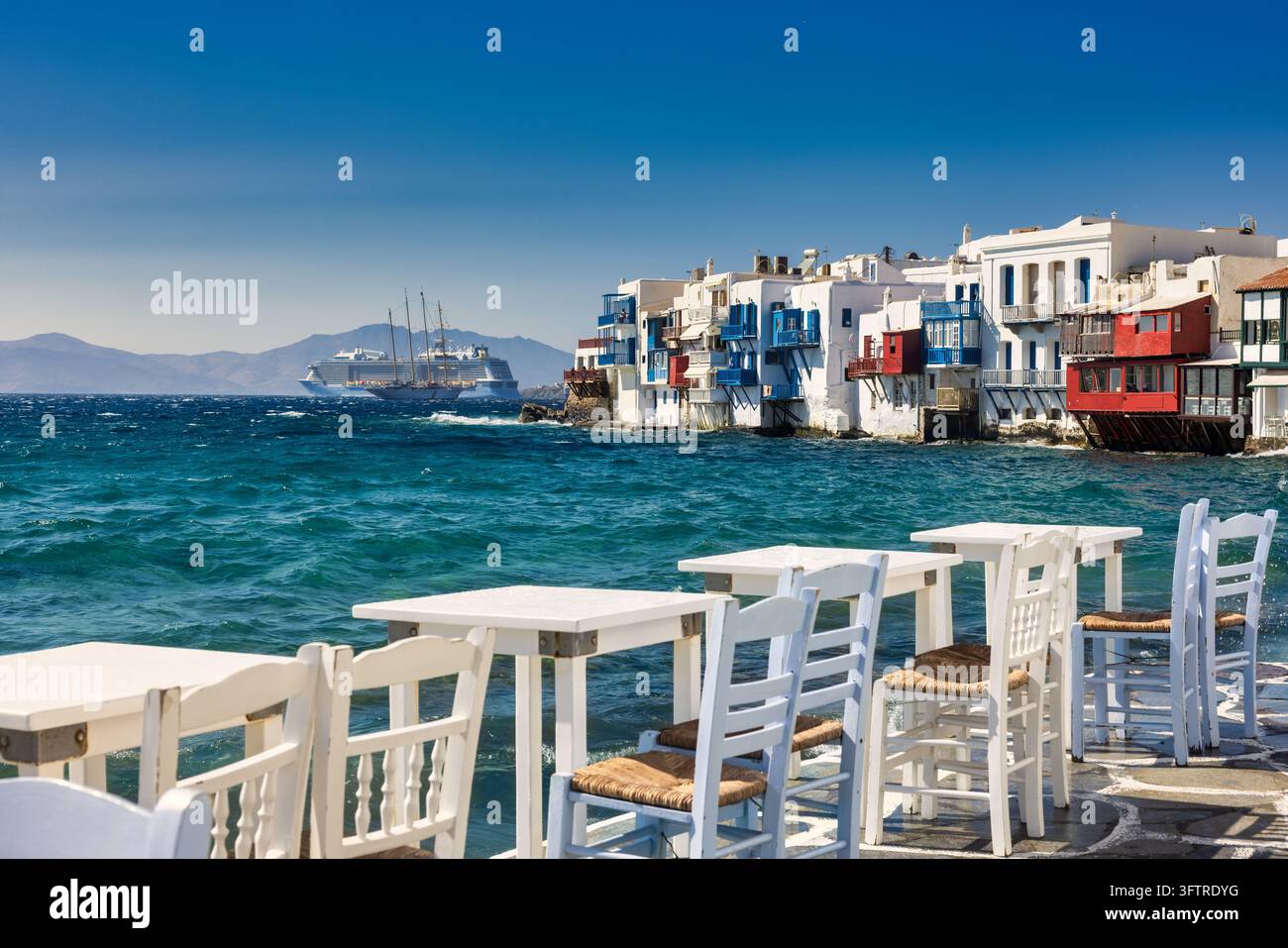 The colorful waterfront buildings of Little Venice in Mykonos stand ...