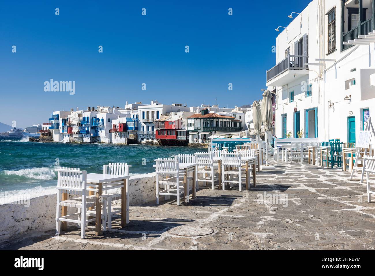 The colorful waterfront buildings of Little Venice in Mykonos stand ...