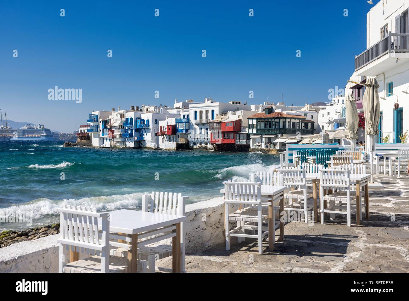 The colorful waterfront buildings of Little Venice in Mykonos stand ...