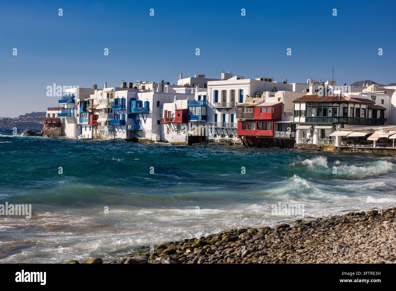 The colorful waterfront buildings of Little Venice in Mykonos stand ...