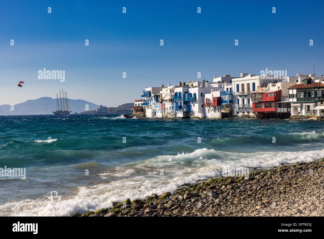 The colorful waterfront buildings of Little Venice in Mykonos stand ...