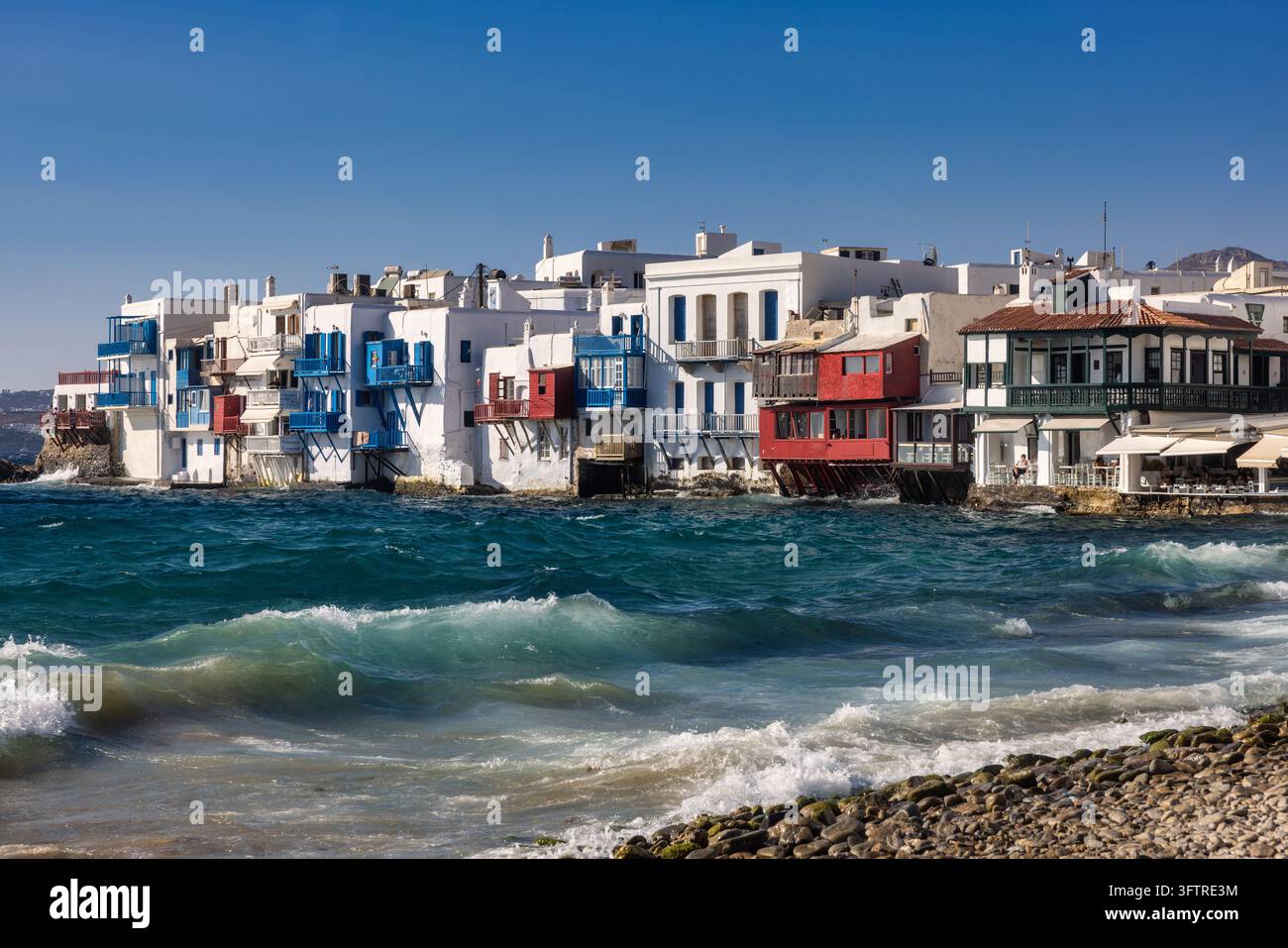 The colorful waterfront buildings of Little Venice in Mykonos stand ...