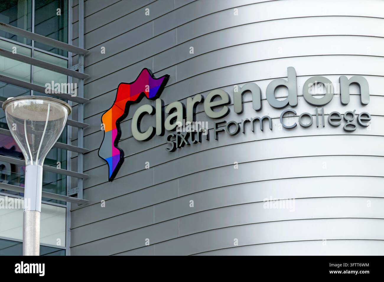 Clarendon Sixth Form College coloured logo and sign on the exterior building in Ashton-under-Lyne. Stock Photo