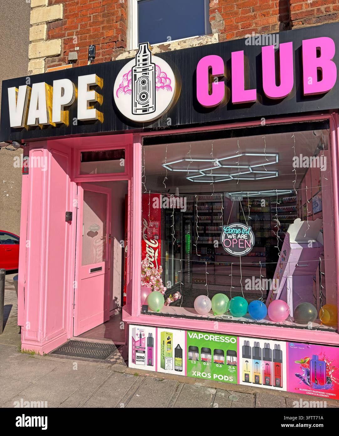 Vape Club shopfront with bright pink sign on Bridge Street in Warrington town centre. Stock Photo