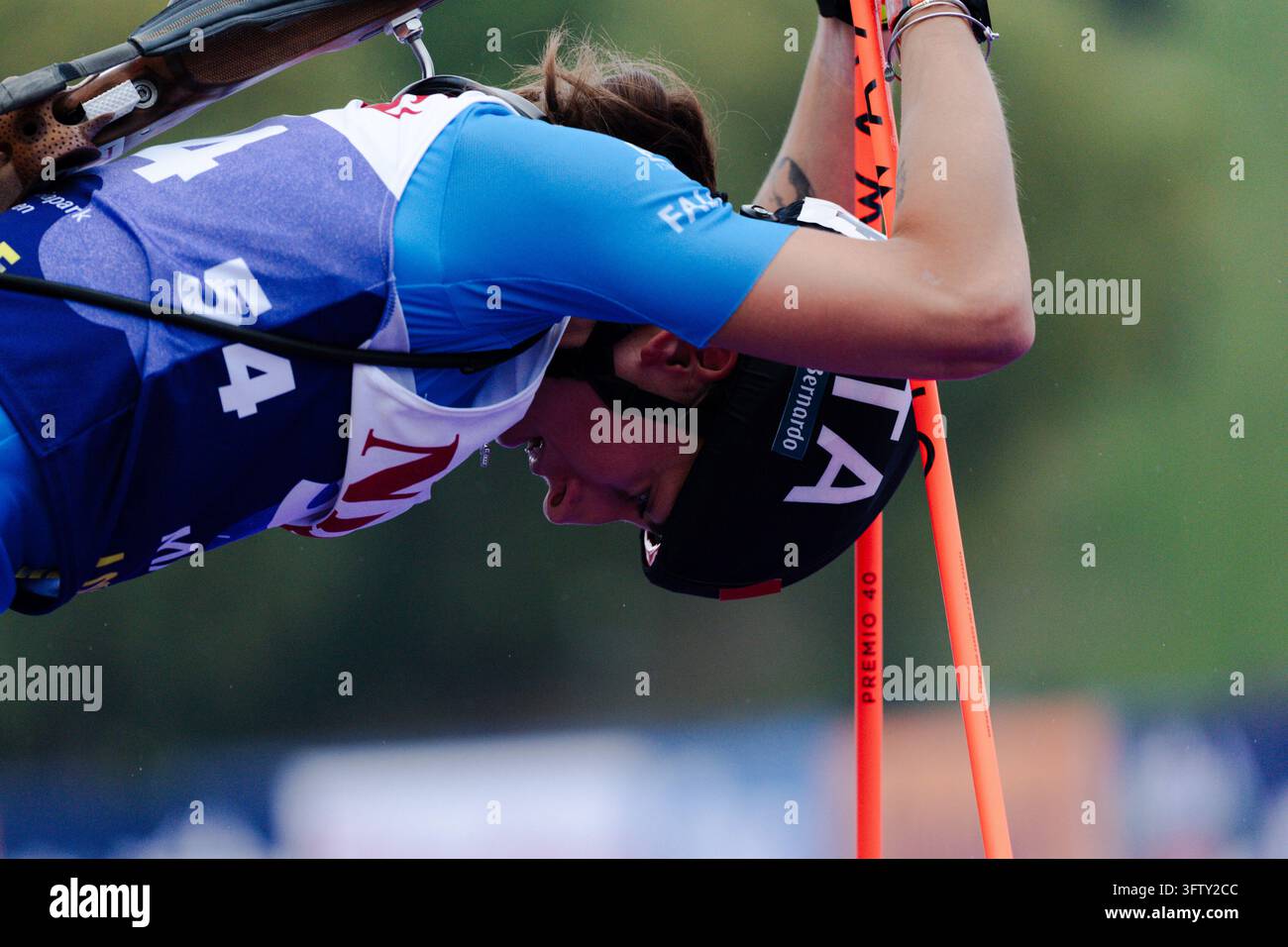 Lisa Vittozzi ( ITA, #54 ) exhausted at the finish line Photo ...