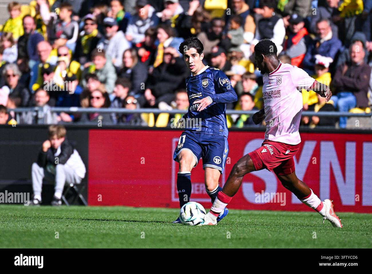 Egor Prutsev of USL Dunkerque and Saidou Sow of FC Nantes during Ligue ...