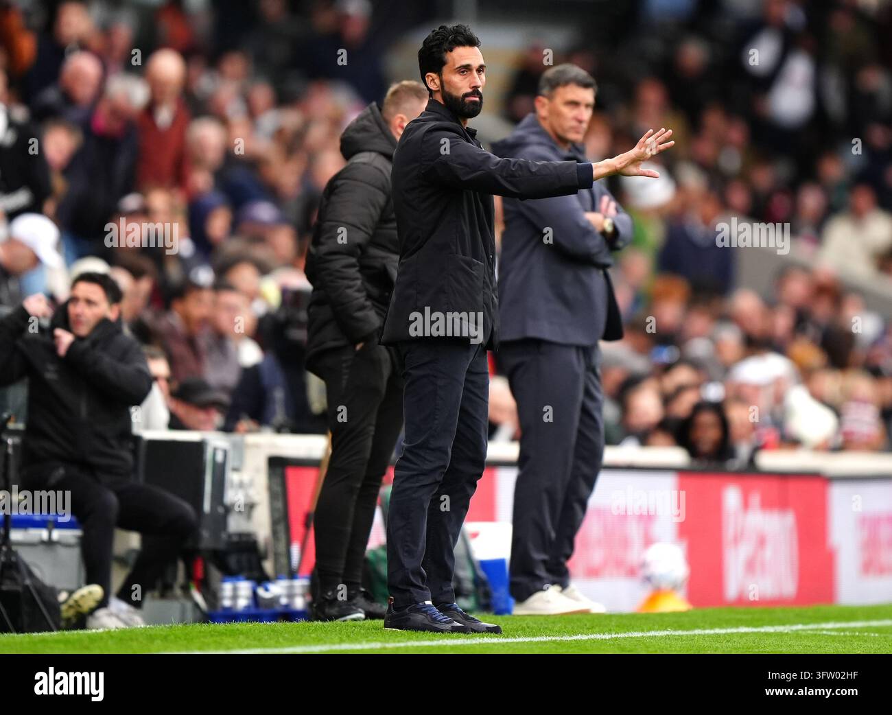 Fulham manager Alvaro Arbeloa (centre) during the Premier League match ...