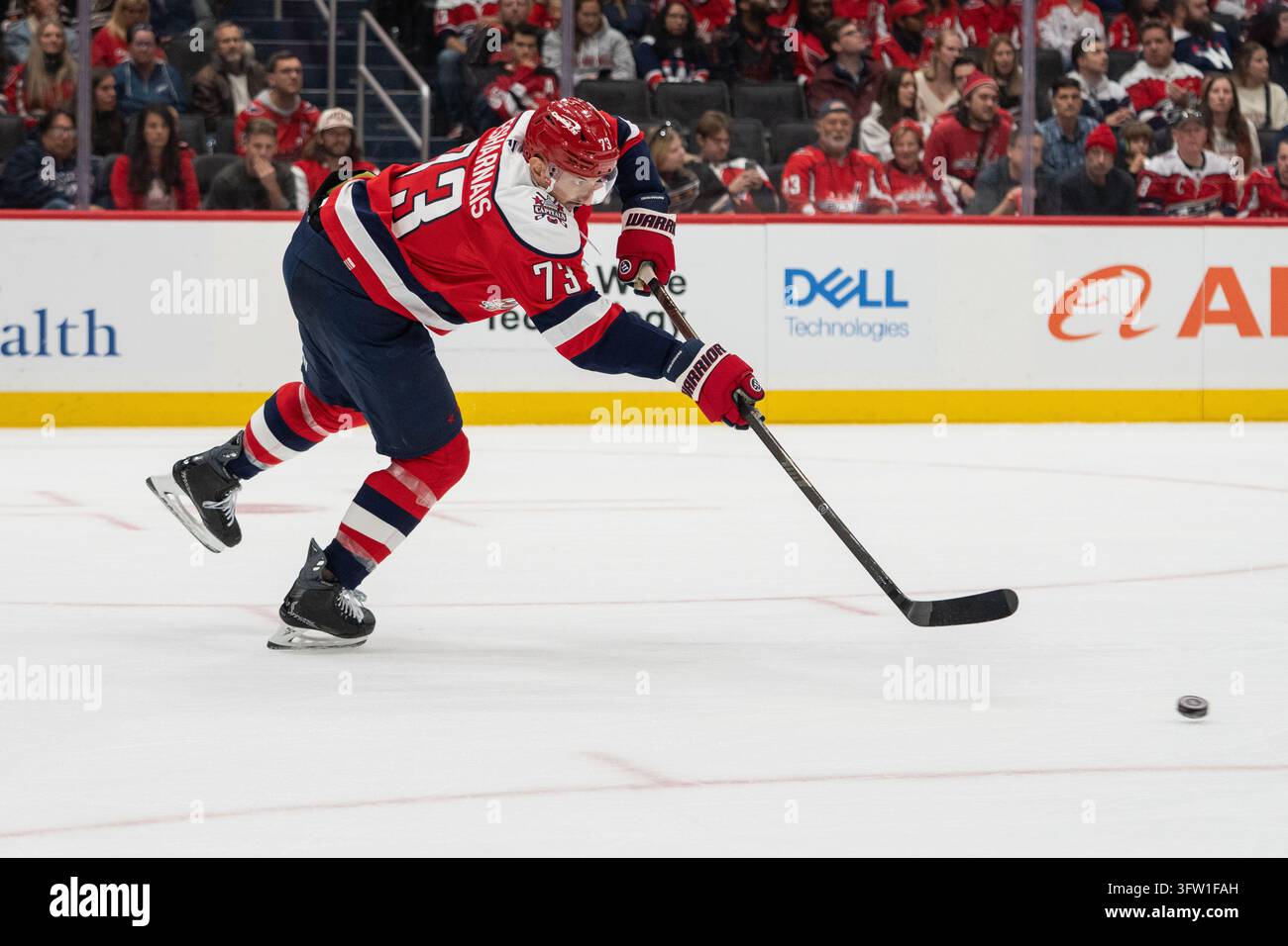 Washington Capitals defenseman Vincent Desharnais (73) clears the puck ...