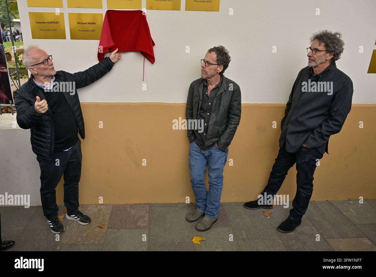 Ethan Coen, Joel Coen alongside Thierry Fremaux unveils a plaque in ...