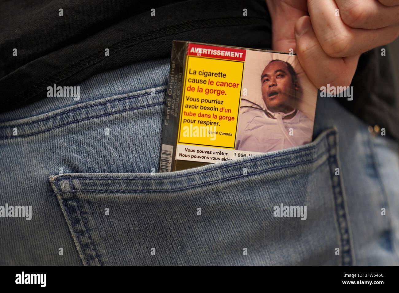 Qan Example An example pack showing new cigarette package warnings is seen in a ...