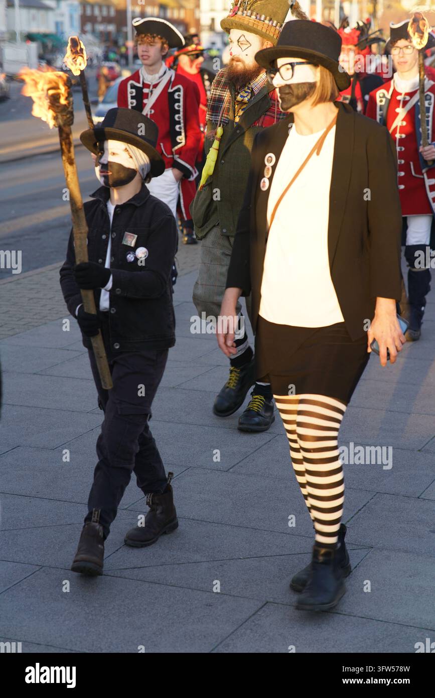 Striped Figure Torchlit costume march hi-res stock photography and images - Alamy
