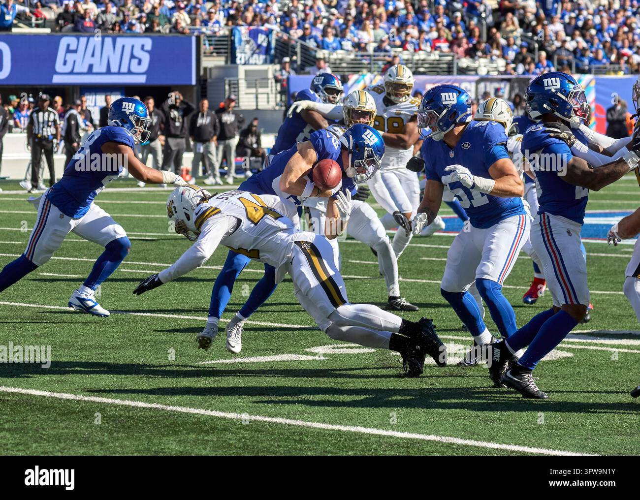 New York Giants kick returner Charlie Jones (89) is hit by New Orleans ...