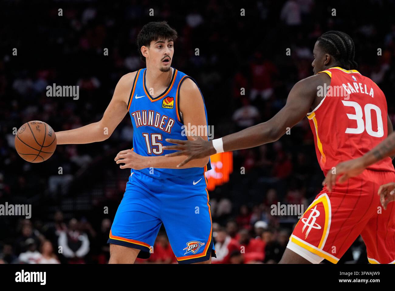 Thgunder Vector Oklahoma City Thunder center Aday Mara (15) is defended by Houston ...