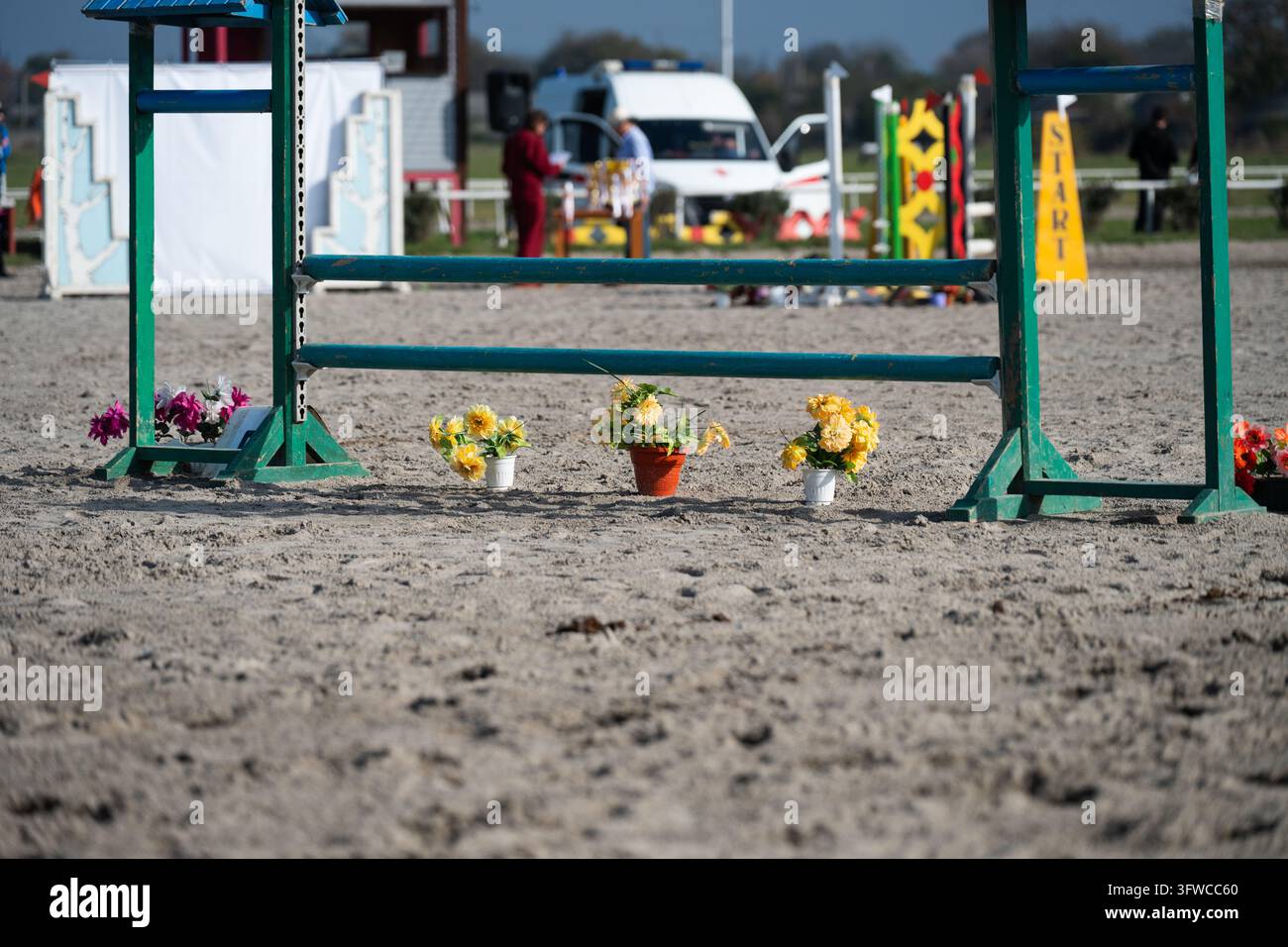 Emergency medical service car waiting at a horse riding competition ...