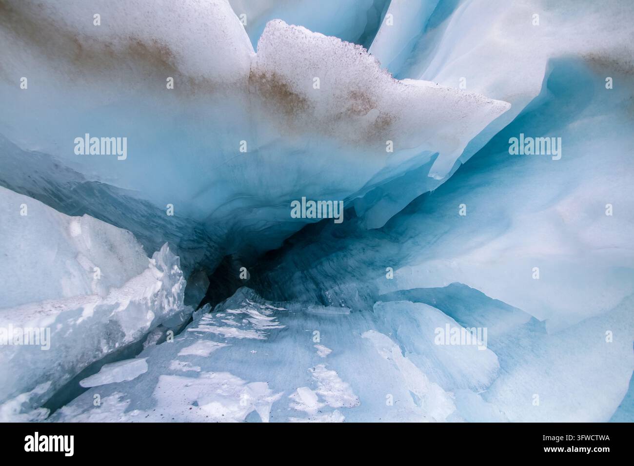 A stunning view from inside a blue ice cave Stock Photo