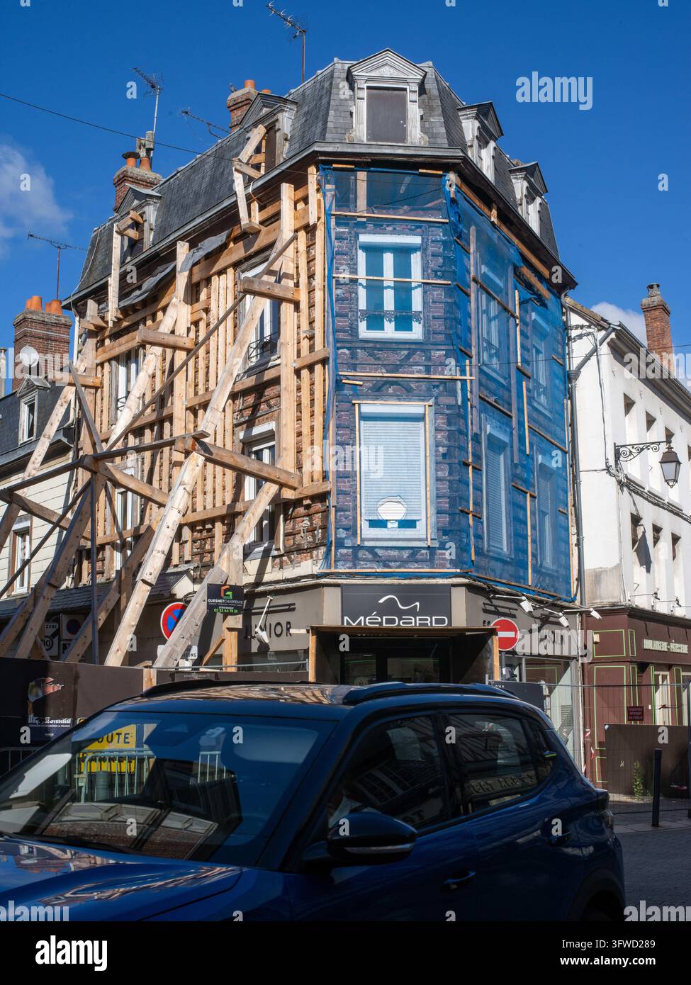 Dilapidated old buildings in the city center of Bernay, France, suffer ...