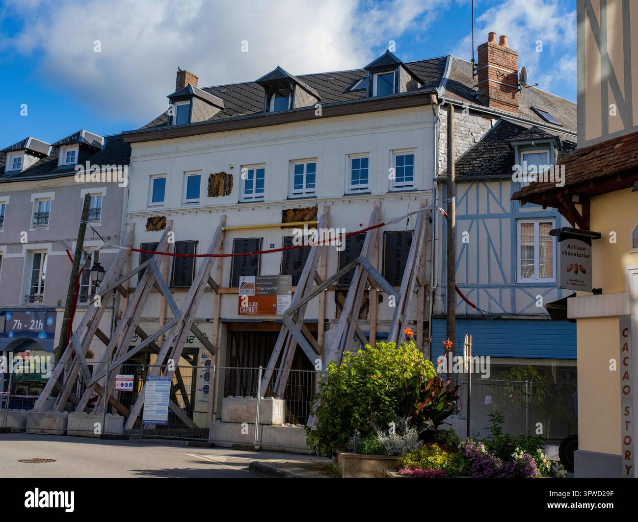 Dilapidated old buildings in the city center of Bernay, France, suffer ...