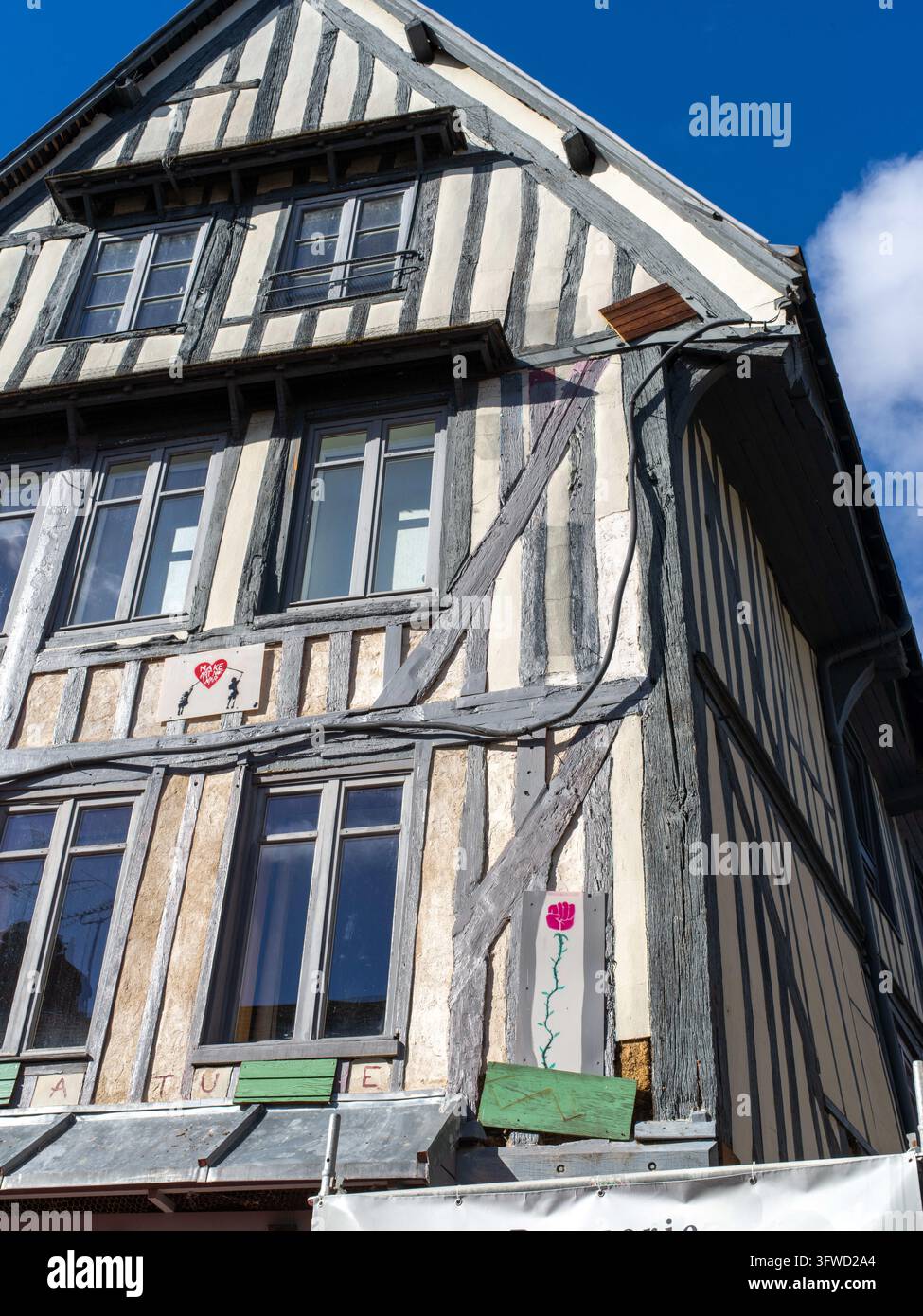 Dilapidated old buildings in the city center of Bernay, France, suffer ...