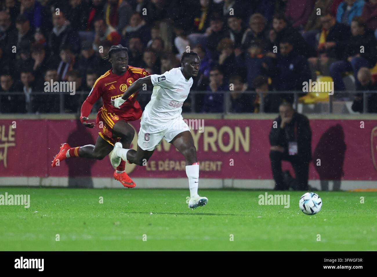 Yael MOUANGA of Montpellier HSC and Mathis Touho of Rodez during Ligue ...