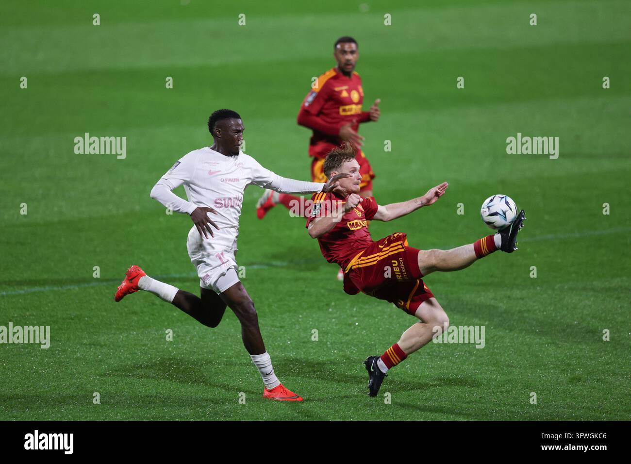 Mamadou Camara of Montpellier and Mathis Magnin of Rodez during Ligue 2 ...