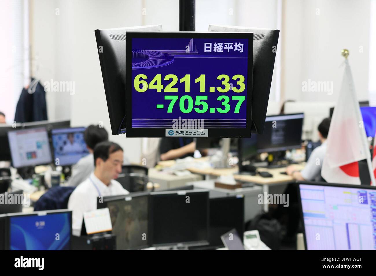 An electronic board displays the Nikkei Stock Average (Nikkei 225) in ...