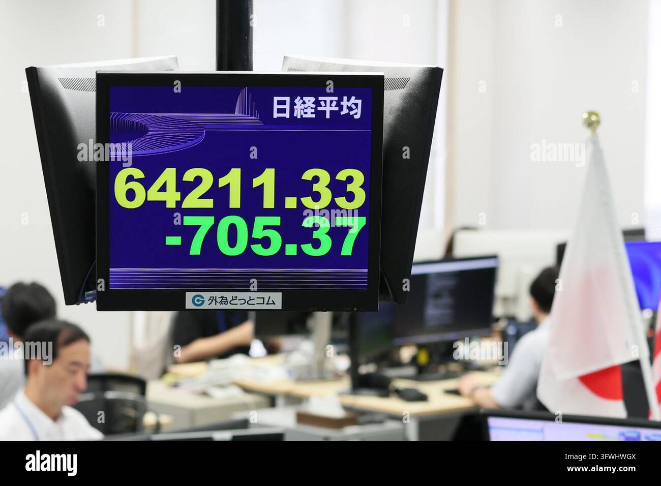 An electronic board displays the Nikkei Stock Average (Nikkei 225) in ...