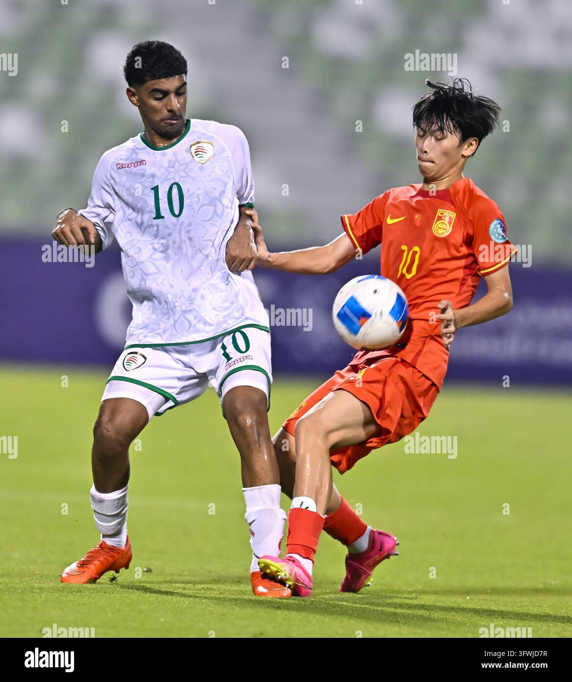 Peng Xianchen (R) of China and Abdullah Ali Alfarsi of Oman seen in ...
