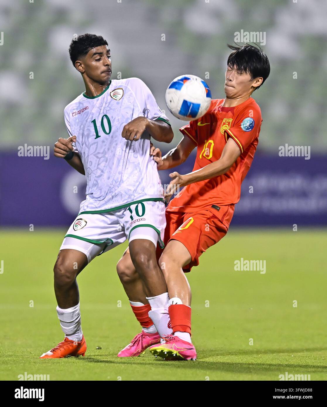 Peng Xianchen (R) of China and Abdullah Ali Alfarsi of Oman seen in ...