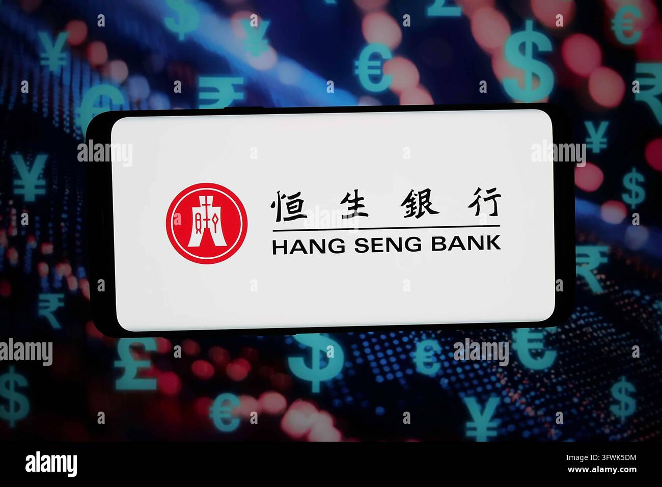 In this photo illustration, the logo of company Hang Seng Bank Limited ...