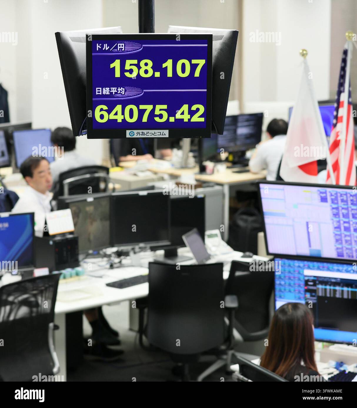 An electronic board displays the current exchange rate of the Japanese ...