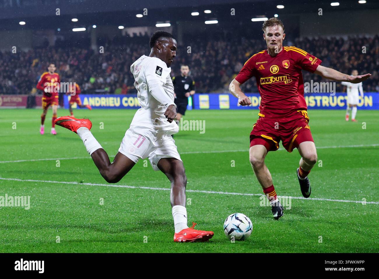 Mamadou CAMARA of Montpellier and Mathis MAGNIN of Rodez during Ligue 2 ...