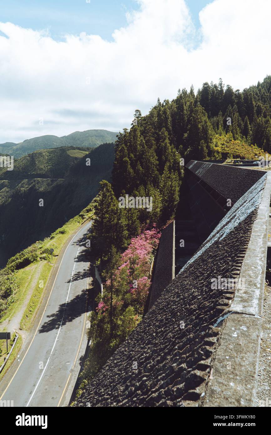 Scenic coastal road winding through the lush volcanic landscape near ...