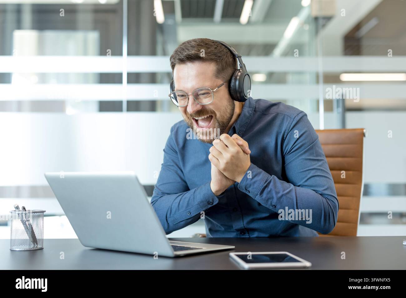 He Smiling Vector Smiling man wearing headphones reacts with excitement while working on ...