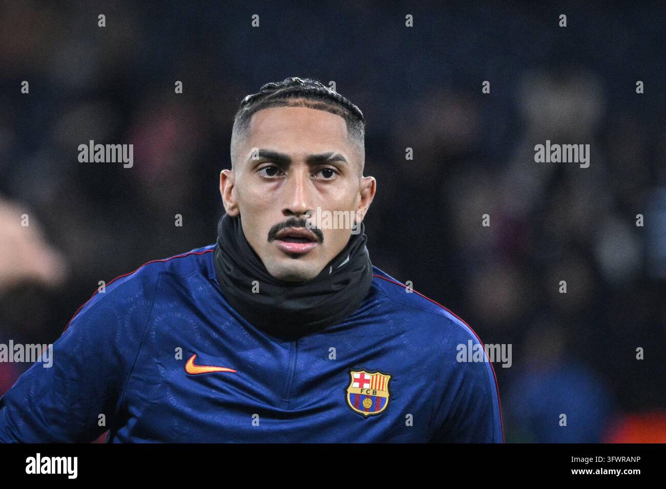 FC Barcelona’s Raphinha warms up before the UEFA Champions League final ...