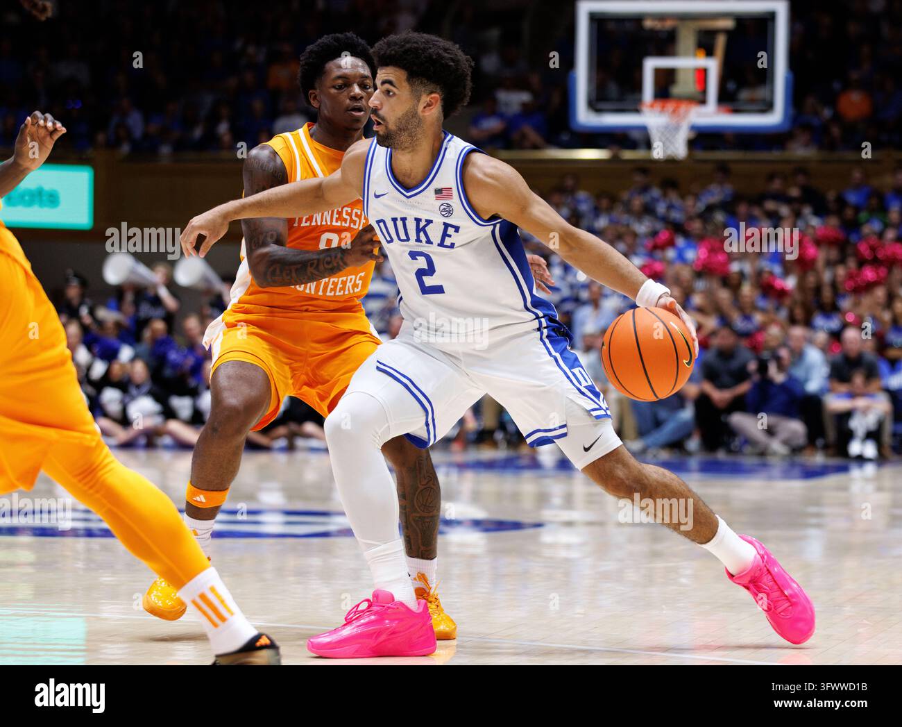 Duke's Cayden Boozer (2) handles the ball as Tennessee's Marquis Clark ...